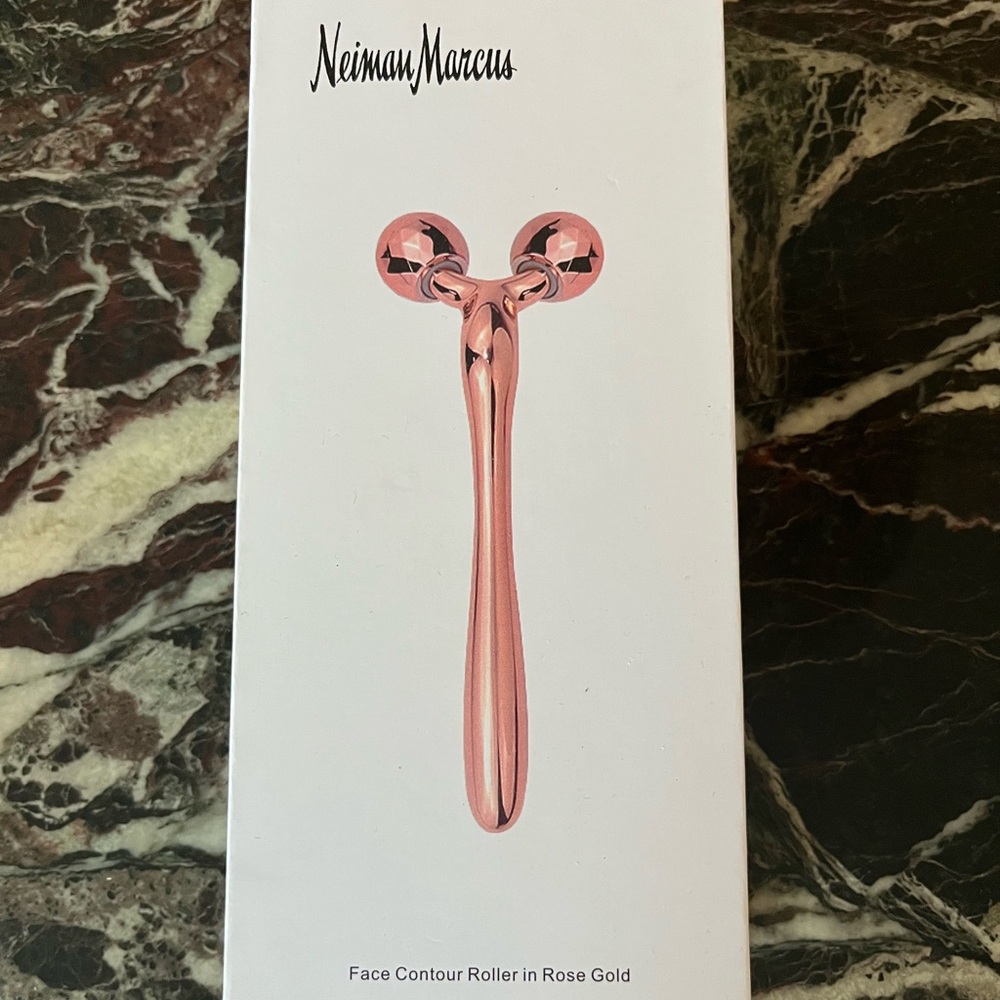 Neiman Marcus Rose Gold Face Roller. New in box.